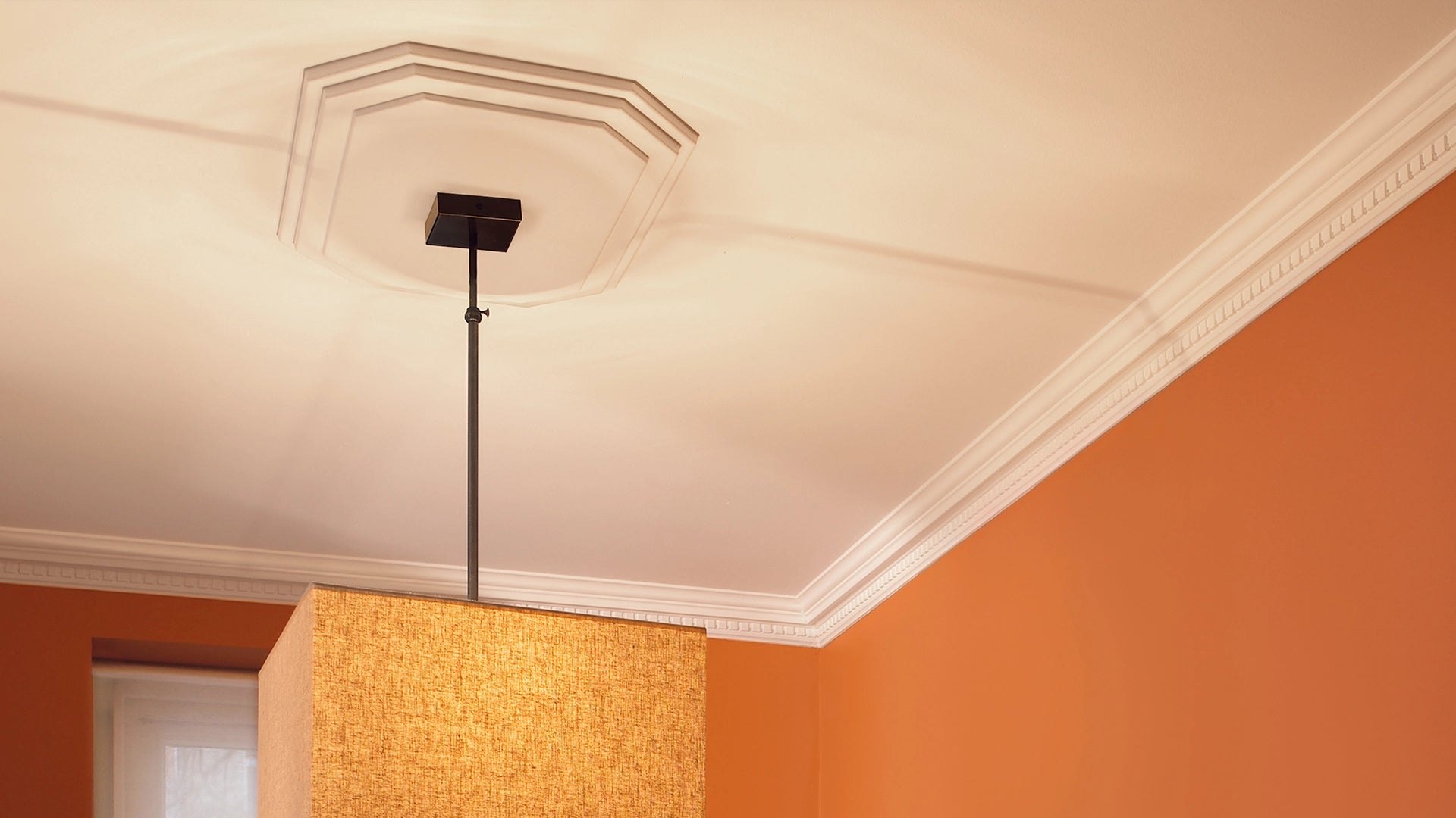 NMC Ceiling Coving and cornice collection on orange wall Decormania UK